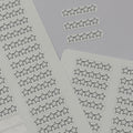 Two sheets of planner stickers featuring rows of outlined one-to-five star rating boxes, with blank rectangular sticker spaces on the left sheet. The sheets are arranged on a light gray background, and the brand name 'planner smarti' is visible on the bottom left.